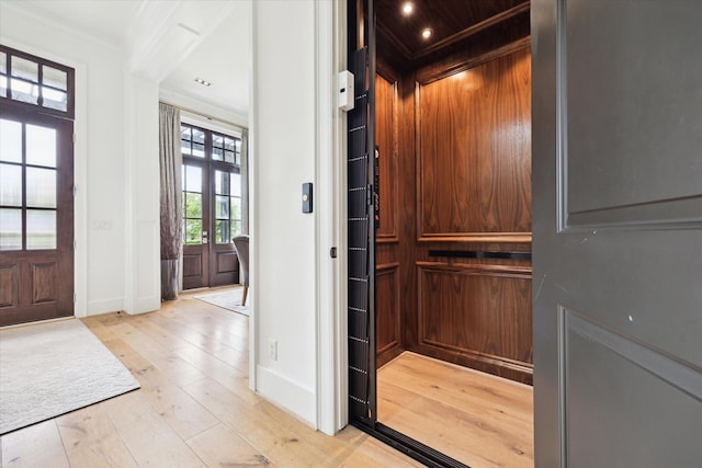 5420 Maple St, Bellaire, TX 77401 - elevator with wood finished floors, ornamental molding, and baseboards
