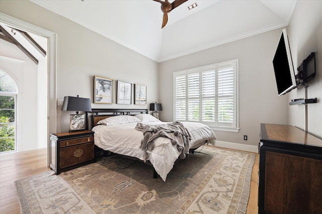 5420 Maple St, Bellaire, TX 77401 - bedroom featuring light wood-style flooring and lofted ceiling