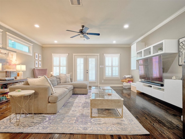 228 E Woodland St, Houston, TX 77009 - living room with dark wood finished floors, ceiling fan, crown molding, recessed lighting, and baseboards
