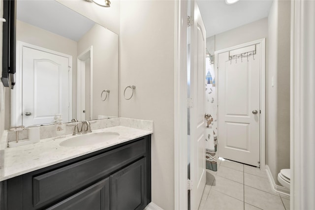 2635 Cedar Path Ln, Conroe, TX 77385 - bathroom with vanity, tile patterned floors, toilet, baseboards, and a shower with shower curtain