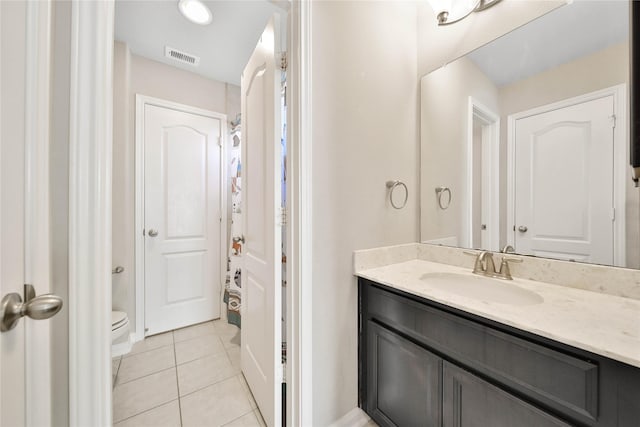 2635 Cedar Path Ln, Conroe, TX 77385 - bathroom with vanity, tile patterned flooring, and toilet
