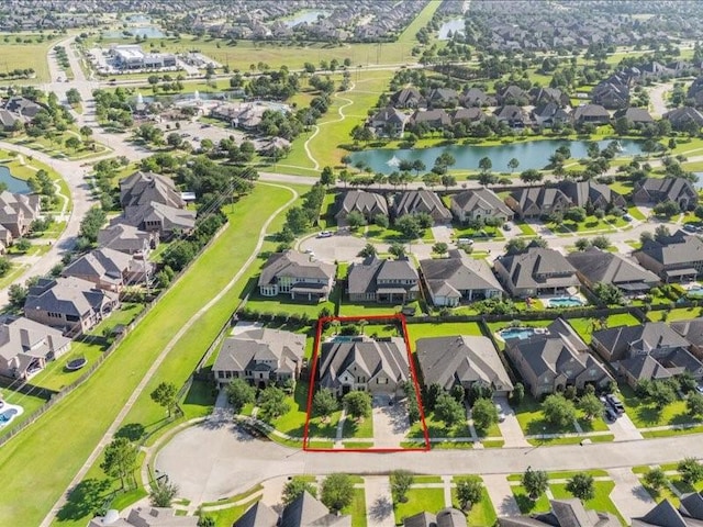 20326 Scarlett Saddle Ct, Cypress, TX 77433 - aerial view of residential area featuring a nearby body of water and property parcel outlined
