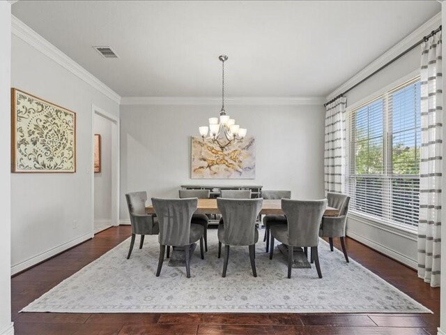 20326 Scarlett Saddle Ct, Cypress, TX 77433 - dining room featuring a chandelier, ornamental molding, wood finished floors, and baseboards