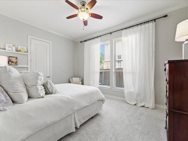20326 Scarlett Saddle Ct, Cypress, TX 77433 - carpeted bedroom with ornamental molding, baseboards, and a ceiling fan