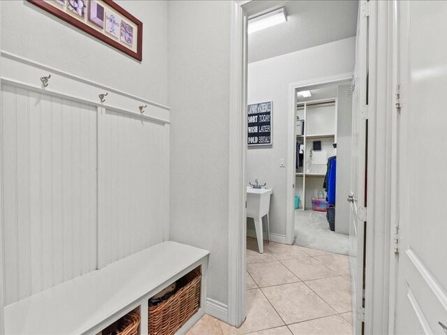 20326 Scarlett Saddle Ct, Cypress, TX 77433 - mudroom with light tile patterned flooring