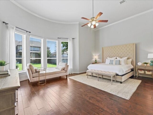 20326 Scarlett Saddle Ct, Cypress, TX 77433 - bedroom with multiple windows, crown molding, wood finished floors, baseboards, and a ceiling fan