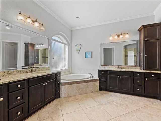 20326 Scarlett Saddle Ct, Cypress, TX 77433 - bathroom featuring two vanities, crown molding, a garden tub, and tile patterned floors