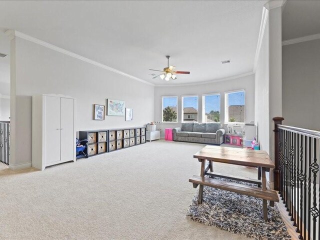 20326 Scarlett Saddle Ct, Cypress, TX 77433 - living area with crown molding, ceiling fan, carpet, and baseboards