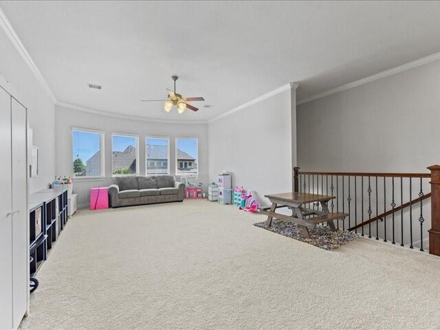 20326 Scarlett Saddle Ct, Cypress, TX 77433 - rec room featuring crown molding, carpet flooring, and a ceiling fan