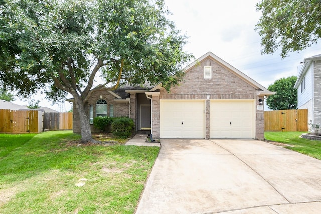 9203 Windy Spring Ct, Houston, TX 77089 - view of front of home with a garage, brick siding, a gate, and concrete driveway