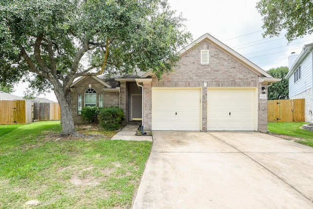 9203 Windy Spring Ct, Houston, TX 77089 - view of front of house featuring brick siding, an attached garage, concrete driveway, and a gate