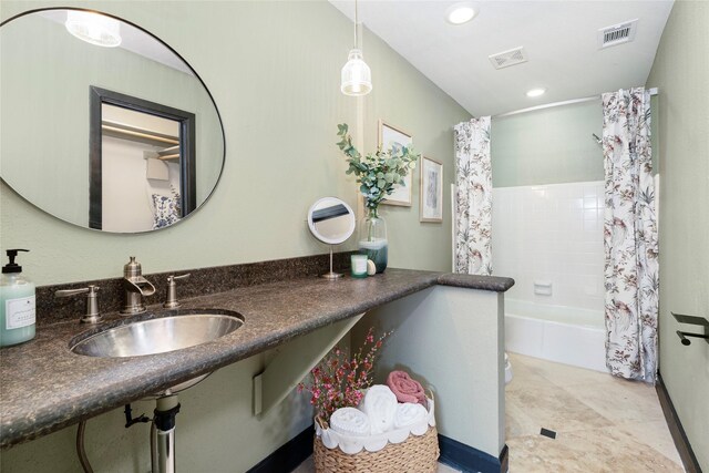 18138 Bal Harbour Dr, Houston, TX 77058 - full bath featuring a sink, shower / tub combo with curtain, and recessed lighting