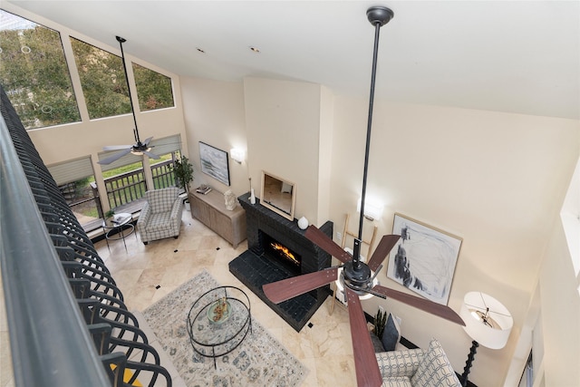 18138 Bal Harbour Dr, Houston, TX 77058 - living room featuring high vaulted ceiling, ceiling fan, and a brick fireplace
