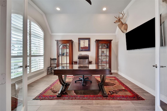 7118 Kinglet Ct, Katy, TX 77493 - home office with plenty of natural light, crown molding, baseboards, wood finished floors, and recessed lighting