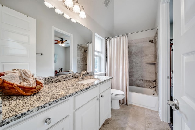 7118 Kinglet Ct, Katy, TX 77493 - bathroom with toilet, vanity, shower / bath combo, and ceiling fan