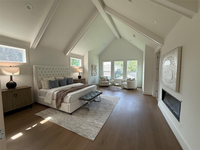 1846 Hewitt Dr, Houston, TX 77018 - bedroom with beamed ceiling, wood finished floors, a glass covered fireplace, and high vaulted ceiling