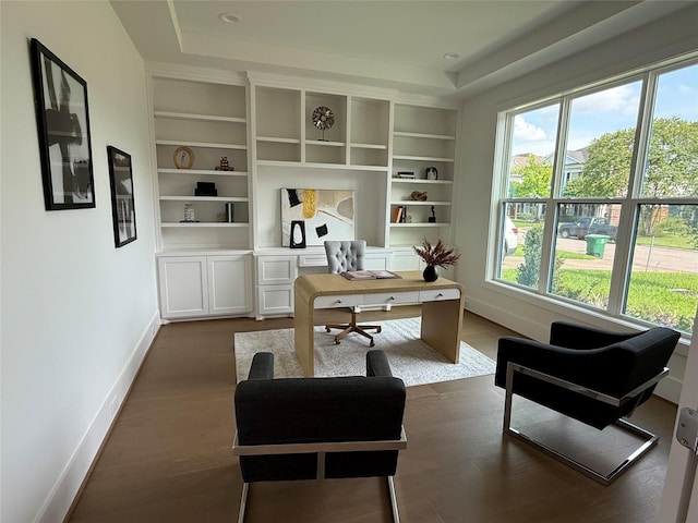 1846 Hewitt Dr, Houston, TX 77018 - home office with a raised ceiling, built in features, and dark wood finished floors