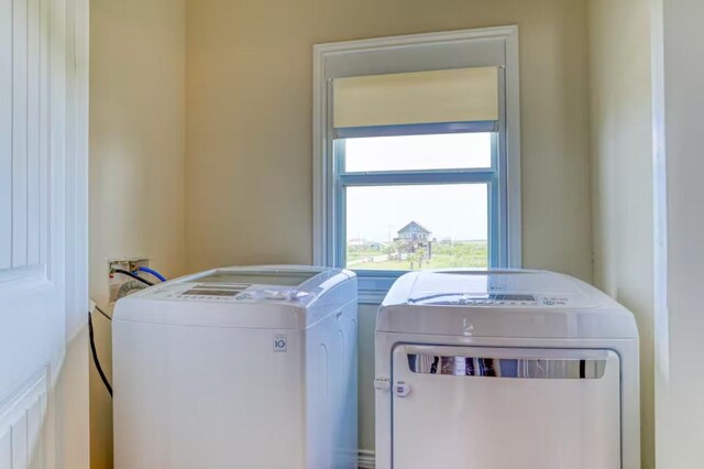 2366 Hwy 87, Gilchrist, TX 77617 - washroom featuring independent washer and dryer