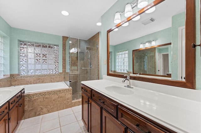 6119 Plantation Bay Dr, Katy, TX 77449 - bathroom featuring vanity, a stall shower, a bath, and recessed lighting