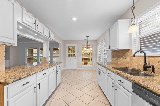 6119 Plantation Bay Dr, Katy, TX 77449 - kitchen featuring dishwasher, a sink, backsplash, white cabinets, and recessed lighting