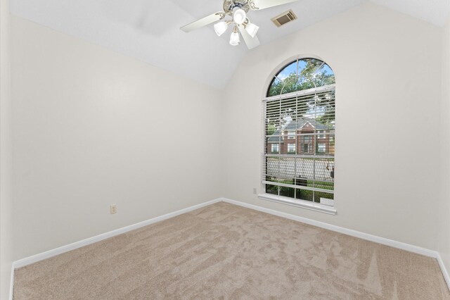 6119 Plantation Bay Dr, Katy, TX 77449 - carpeted empty room with vaulted ceiling, ceiling fan, and baseboards