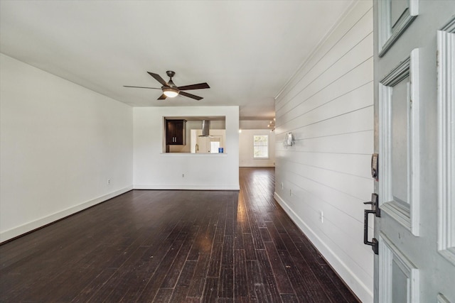 1326 Curtin St, Houston, TX 77018 - unfurnished living room featuring dark wood-type flooring and a ceiling fan