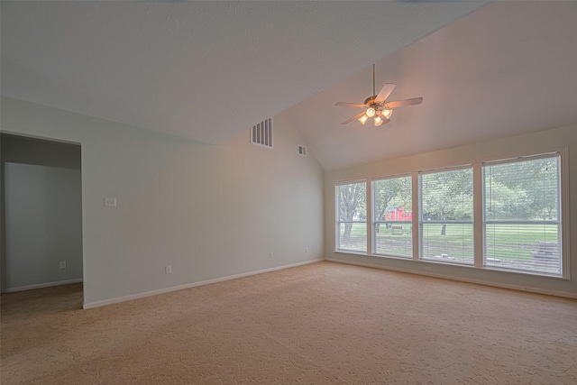 144 Pin Oak Ln, Hempstead, TX 77445 - unfurnished room with ceiling fan, light carpet, high vaulted ceiling, and baseboards