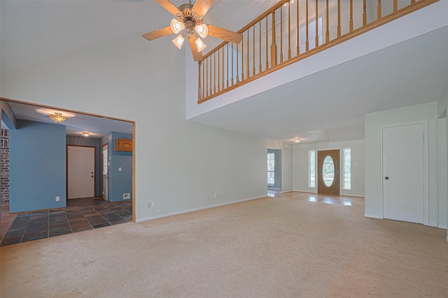 144 Pin Oak Ln, Hempstead, TX 77445 - unfurnished living room featuring a high ceiling, a ceiling fan, carpet flooring, and baseboards