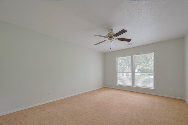 144 Pin Oak Ln, Hempstead, TX 77445 - empty room featuring a ceiling fan, baseboards, and light colored carpet