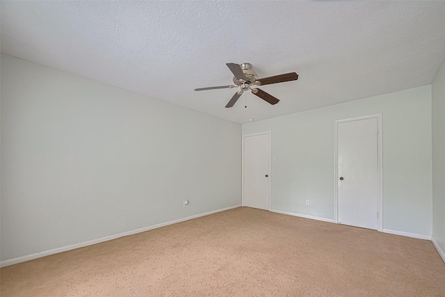 144 Pin Oak Ln, Hempstead, TX 77445 - empty room featuring ceiling fan, light carpet, and baseboards