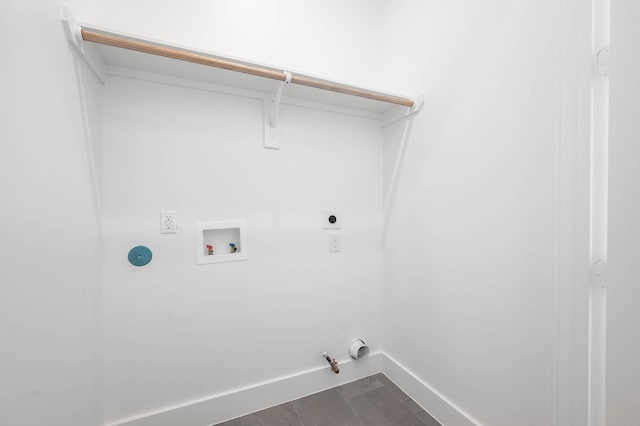 3808 Jefferson St, Houston, TX 77003 - laundry room with hookup for a gas dryer, electric dryer hookup, hookup for a washing machine, baseboards, and dark wood-type flooring