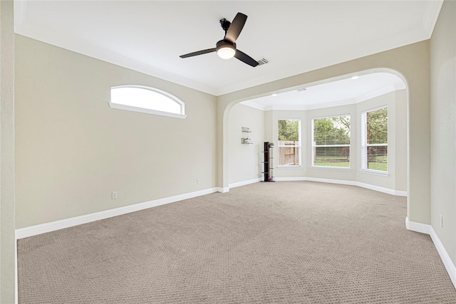 3730 Arundel Gardens Ln, Sugar Land, TX 77498 - spare room with ornamental molding, light colored carpet, arched walkways, baseboards, and ceiling fan