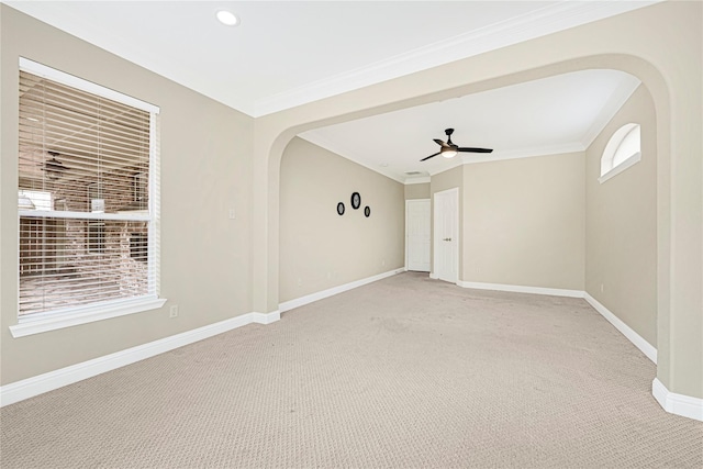 3730 Arundel Gardens Ln, Sugar Land, TX 77498 - unfurnished room with light colored carpet, baseboards, ceiling fan, arched walkways, and ornamental molding