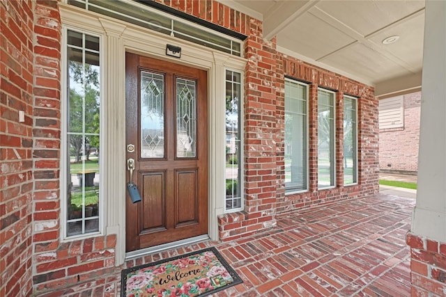 3730 Arundel Gardens Ln, Sugar Land, TX 77498 - view of exterior entry with a porch and brick siding