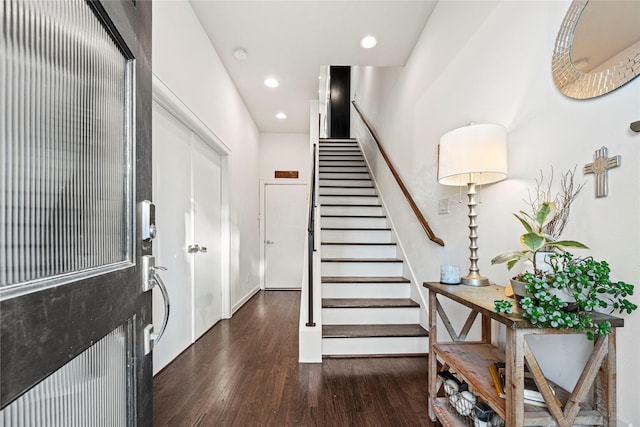 104 Pierce St, Houston, TX 77002 - entryway with wood finished floors, stairs, recessed lighting, and baseboards