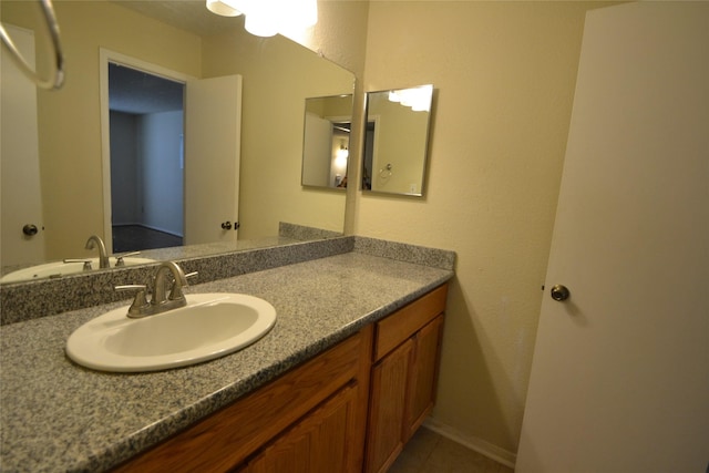 2121 Hepburn Sts Unit 713, Houston, TX 77054 - bathroom with vanity and tile patterned floors
