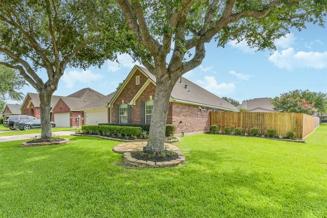 7518 Rain Meadow Ln, Cypress, TX 77433 - view of front of property with brick siding, an attached garage, and concrete driveway