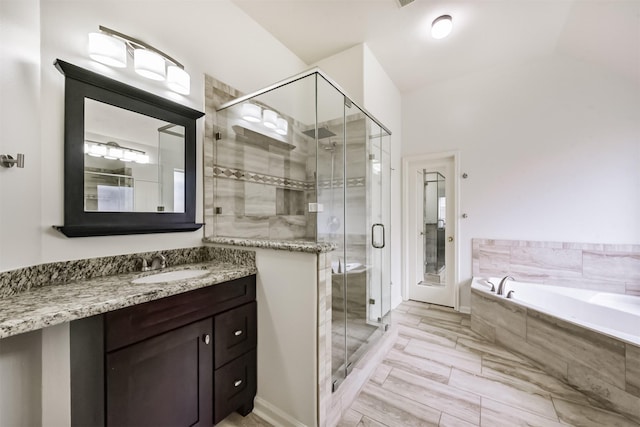 7518 Rain Meadow Ln, Cypress, TX 77433 - full bath with a garden tub, vanity, and a shower stall