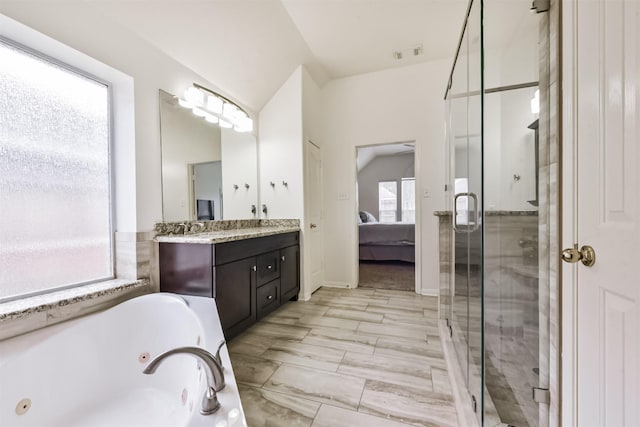 7518 Rain Meadow Ln, Cypress, TX 77433 - ensuite bathroom featuring vanity, a stall shower, and a jetted tub