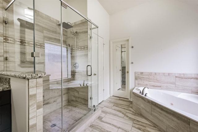 7518 Rain Meadow Ln, Cypress, TX 77433 - bathroom with a whirlpool tub, a stall shower, and vanity