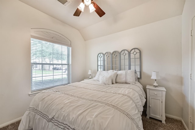 7518 Rain Meadow Ln, Cypress, TX 77433 - bedroom featuring dark colored carpet, baseboards, vaulted ceiling, and ceiling fan