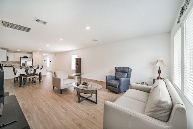 337 Riverwood Village Ln, Sealy, TX 77474 - living area with light wood-style floors and recessed lighting