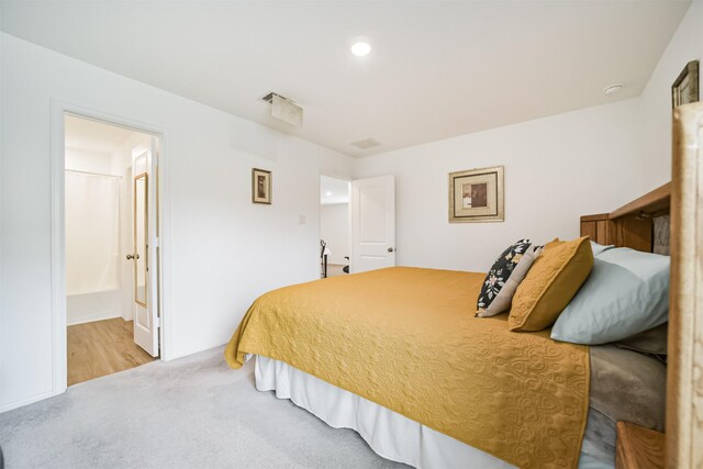 337 Riverwood Village Ln, Sealy, TX 77474 - bedroom with recessed lighting and carpet