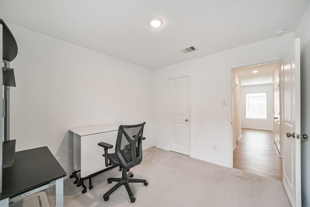 337 Riverwood Village Ln, Sealy, TX 77474 - home office with light colored carpet, recessed lighting, and baseboards