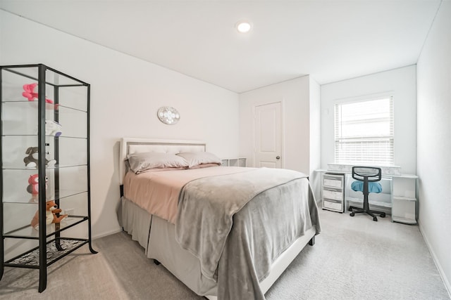 337 Riverwood Village Ln, Sealy, TX 77474 - bedroom featuring light carpet and baseboards