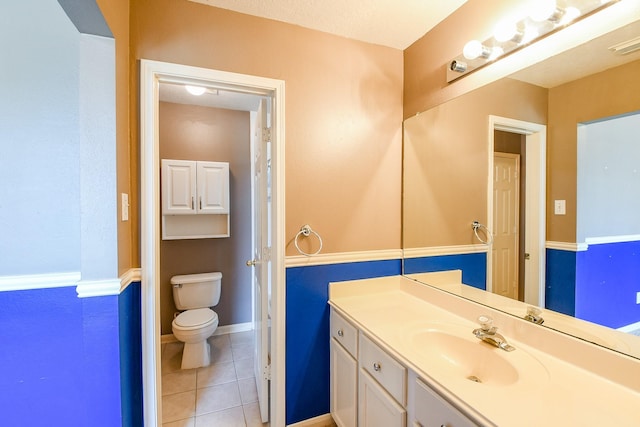 3550 Beacons Vw, Friendswood, TX 77546 - bathroom featuring vanity, tile patterned flooring, and toilet