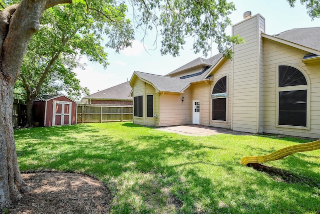 3550 Beacons Vw, Friendswood, TX 77546 - back of property featuring a patio area, a chimney, and roof with shingles