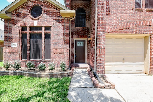 3550 Beacons Vw, Friendswood, TX 77546 - view of exterior entry featuring brick siding and concrete driveway