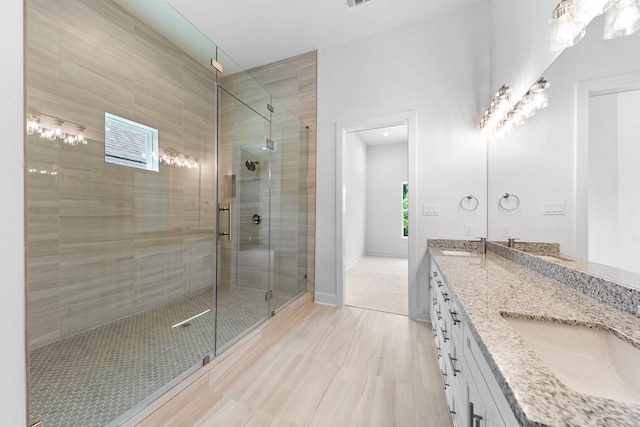 4710 Gunter St, Houston, TX 77020 - full bath with double vanity, a stall shower, and tile patterned floors