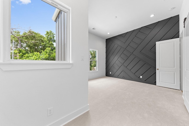 4710 Gunter St, Houston, TX 77020 - carpeted empty room featuring baseboards and recessed lighting